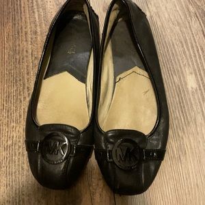 Michael Kors black/black emblem flats